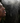 image of a man with his eyes closed, and mist is being sprayed onto his face